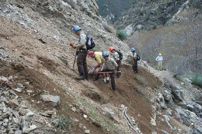 CCC removing rock/dirt slide