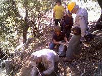 Edge of trail gets rock work done