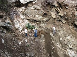 Working on restoring the tread across the blasted gap